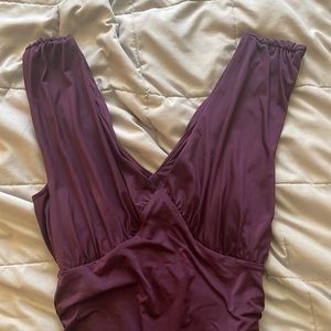 Deep V-neck song, body suit from Xpress never worn